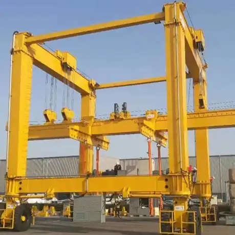 Industrial Straddle Carrier operating in logistics yard