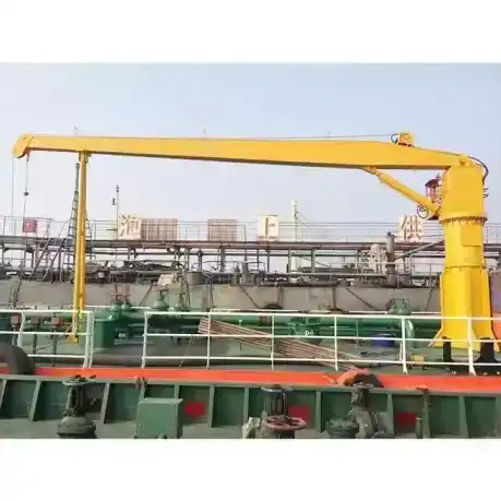 Offshore crane lifting heavy cargo at sea – durable marine deck crane for ships